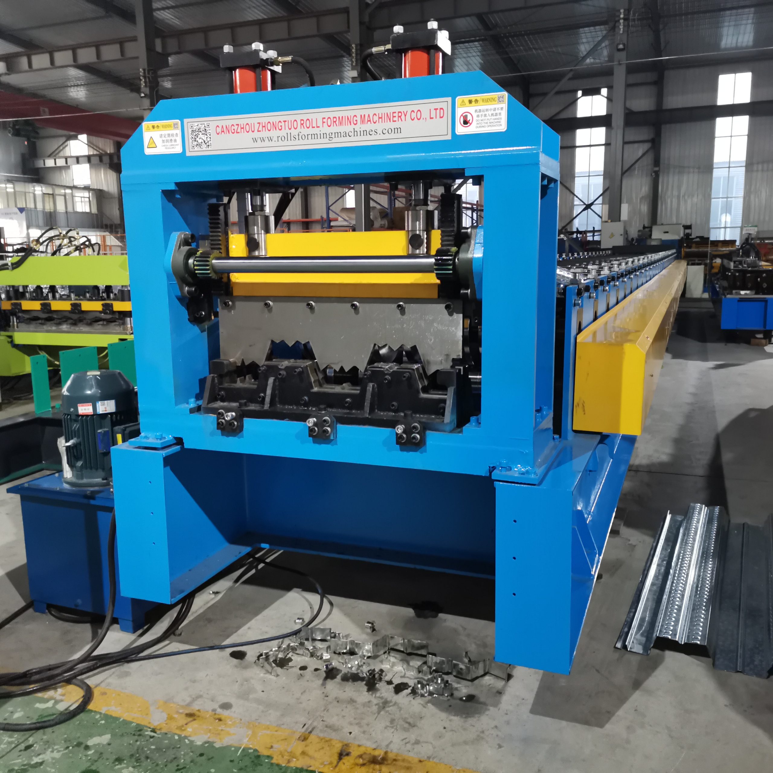 Floor decking machine